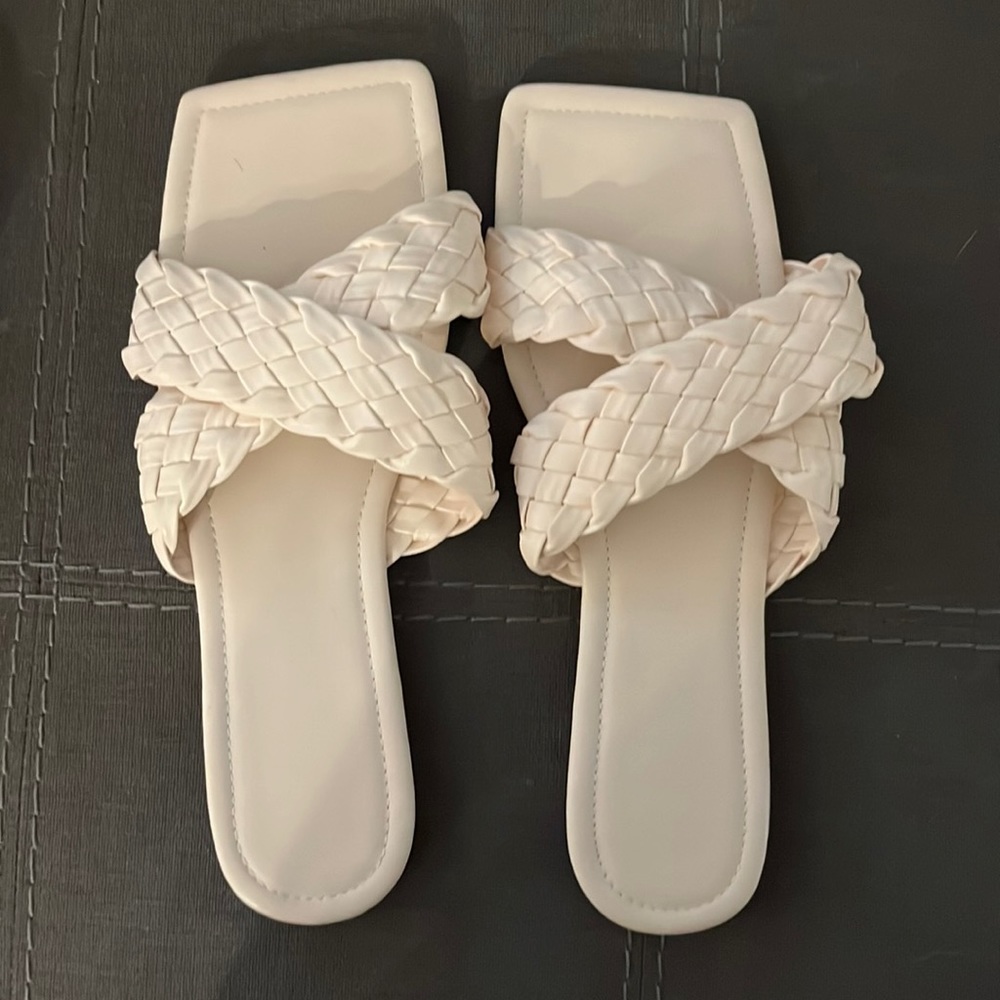 Never worn cream sandals.